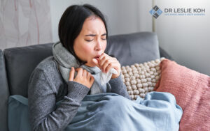woman consulting her throat condition to a doctor