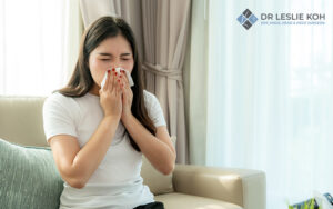woman suffering from nasal allergies