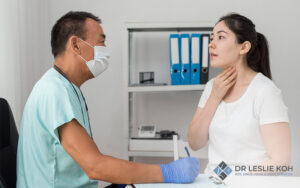 Woman seeing a specialist regarding her throat