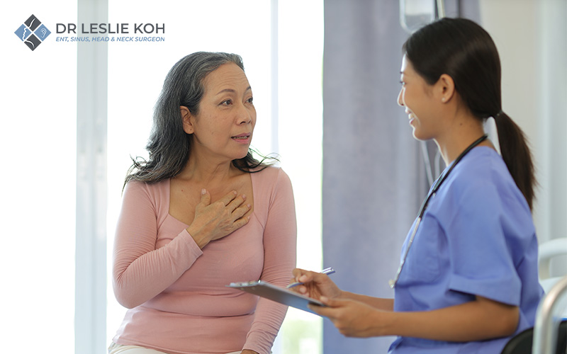 old woman getting checked by a doctor