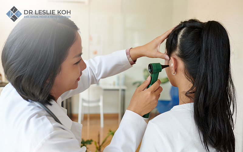 patient getting her ear examined by an ENT doctor